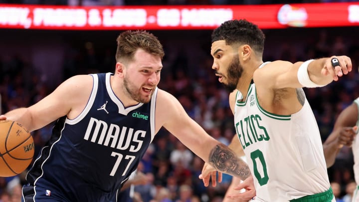 Jun 12, 2024; Dallas, Texas, USA; Dallas Mavericks guard Luka Doncic (77) dribbles the ball against Boston Celtics forward Jayson Tatum (0) during the fourth quarter during game three of the 2024 NBA Finals at American Airlines Center. Mandatory Credit: Kevin Jairaj-USA TODAY Sports