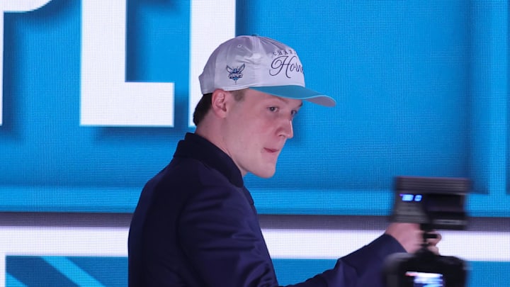 Jun 25, 2025; Brooklyn, NY, USA;  Kon Knueppel looks on after being selected as the fourth pick by the Charlotte Hornets in the first round of the 2025 NBA Draft at Barclays Center. Mandatory Credit: Brad Penner-Imagn Images