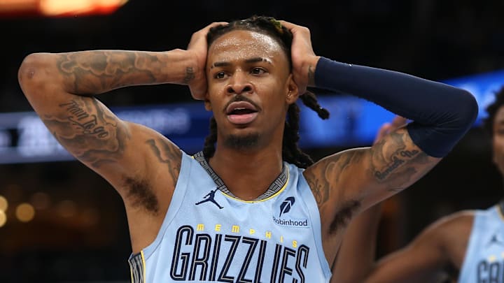 Memphis Grizzlies guard Ja Morant (12) reacts during the second quarter against the Brooklyn Nets at FedExForum on December 13, 2024.