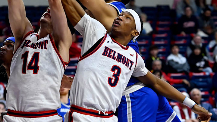 Belmont’s Sam Orme (14), Jonathan Pierre (3) and MTSU forward Essam Mostafa, right, go up for a rebound during an NCAA college basketball game Saturday, Dec. 7, 2024, in Nashville, Tenn. Belmont’s Sam Orme (14), Jonathan Pierre (3) and MTSU forward Essam Mostafa, right, go up for a rebound during an NCAA college basketball game Saturday, Dec. 7, 2024, in Nashville, Tenn.