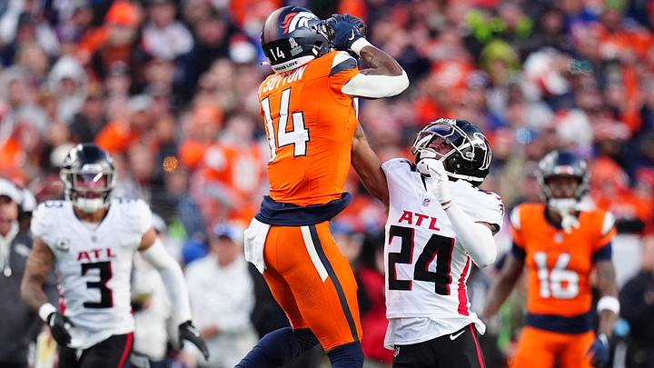 Nov 17, 2024; Denver, Colorado, USA; Denver Broncos wide receiver Courtland Sutton (14) pulls in a reception over Atlanta Falcons cornerback A.J. Terrell (24) in the second half at Empower Field at Mile High. Nov 17, 2024; Denver, Colorado, USA; Denver Broncos wide receiver Courtland Sutton (14) pulls in a reception over Atlanta Falcons cornerback A.J. Terrell (24) in the second half at Empower Field at Mile High.