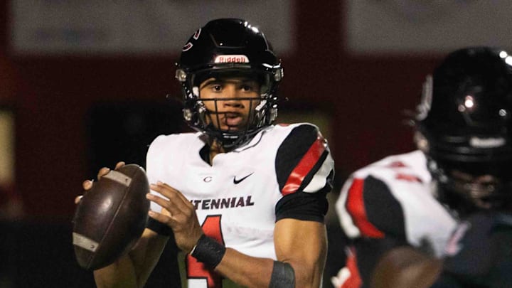 Centennial Huskies Quarterback Husan Longstreet (4) prepares to pass the ball at Liberty High School on Sept. 21, 2024, in Peoria.