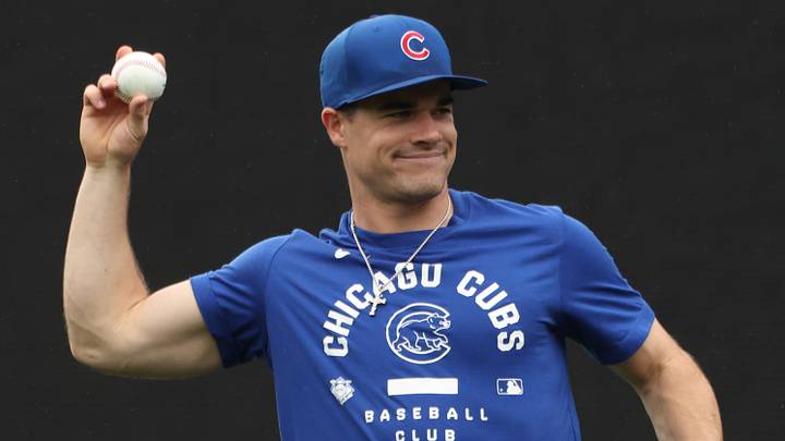 Chicago Cubs right fielder Matt Shaw (6) warms up