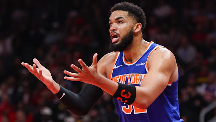 Apr 30, 2026; Atlanta, Georgia, USA; New York Knicks center Karl-Anthony Towns (32) reacts to a call against the Atlanta Hawks in the second quarter during game six of the first round of the 2026 NBA Playoffs at State Farm Arena. Mandatory Credit: Brett Davis-Imagn Images