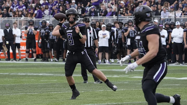 Northwestern Wildcats quarterback Preston Stone throws a touchdown pass to tight end Hunter Welcing against Purdue last week. Northwestern Wildcats quarterback Preston Stone throws a touchdown pass to tight end Hunter Welcing against Purdue last week.