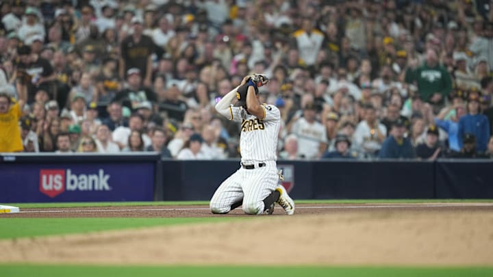 Jul 24, 2023; San Diego, California, USA;  San Diego Padres shortstop Xander Bogaerts (2) reacts to the injury of Pittsburgh Pirates second baseman Tucupita Marcano (30) during the fifth inning at Petco Park. Mandatory Credit: Ray Acevedo-USA TODAY Sports