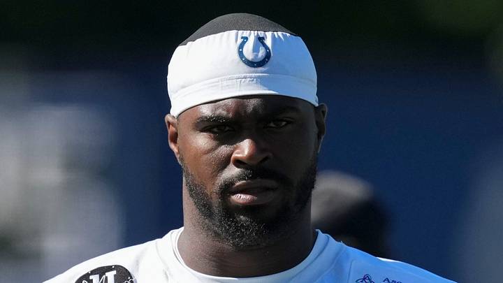 Indianapolis Colts defensive tackle Colby Wooden warms up