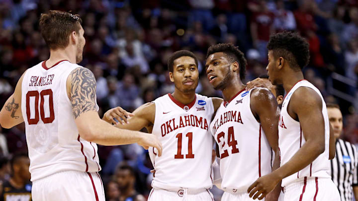 Oklahoma Sooners guard Buddy Hield (24) and guard Isaiah Cousins (11) and forward Ryan Spangler (00) and guard Christian James (3) during the game against the Virginia Commonwealth Rams in the second round of the 2016 NCAA Tournament at Chesapeake Energy Arena. 
