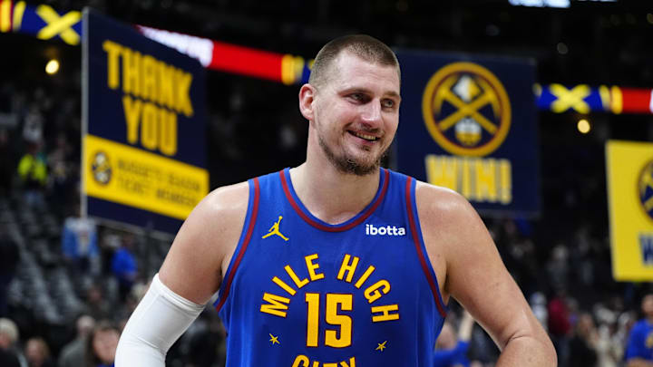 Jan 23, 2025; Denver, Colorado, USA; Denver Nuggets center Nikola Jokic (15) reacts following the win over Sacramento Kings at Ball Arena. Mandatory Credit: Ron Chenoy-Imagn Images