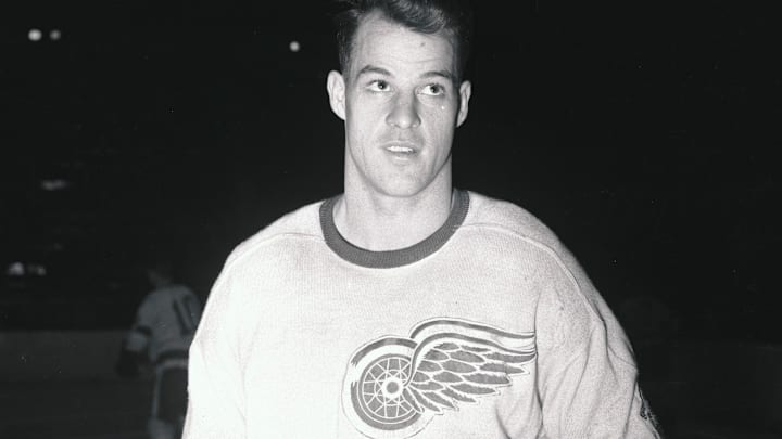 Gordon Howe on Ice With Hockey Stick