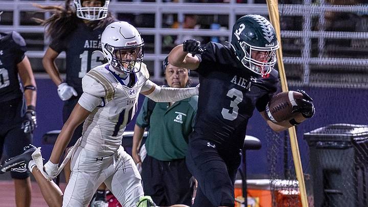 'Aiea WR Cason Brooke breaks free for a big gain against Damien.' Brooke has played a major role in the Na Alii's 3-0 start in 2026, helping lift his team into the Hawaii Elite 12.