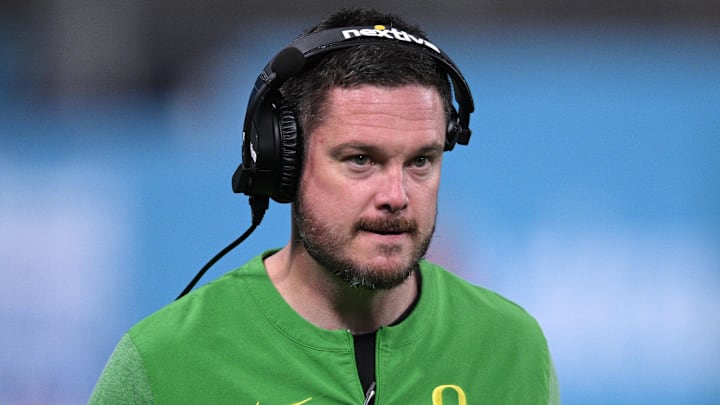 Dec 28, 2022; San Diego, CA, USA; Oregon Ducks head coach Dan Lanning looks on from the sideline during the second half against the North Carolina Tar Heels of the 2022 Holiday Bowl at Petco Park. Mandatory Credit: Orlando Ramirez-Imagn Images Dec 28, 2022; San Diego, CA, USA; Oregon Ducks head coach Dan Lanning looks on from the sideline during the second half against the North Carolina Tar Heels of the 2022 Holiday Bowl at Petco Park. Mandatory Credit: Orlando Ramirez-Imagn Images