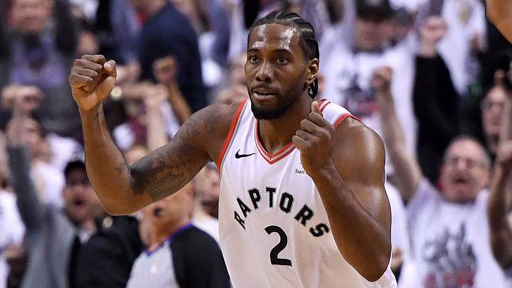 May 12, 2019; Toronto, Ontario, CAN;   Toronto Raptors forward Kawhi Leonard (2) reacts after making a basket against the Philadelphia 76ers in game seven of the second round of the 2019 NBA Playoffs at Scotiabank Arena. Mandatory Credit: Dan Hamilton-USA TODAY Sports