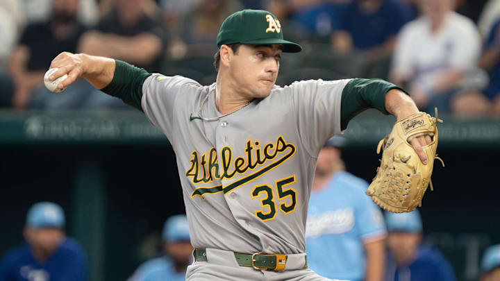Apr 26, 2026; Arlington, Texas, USA;  Athletics pitcher J.T. Ginn (35) throws to the plate during the first inning against the Texas Rangers at Globe Life Field. Mandatory Credit: Raymond Carlin III-Imagn Images