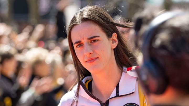 Iowa Hawkeyes guard Caitlin Clark (22) arrives for the NCAA Tournament championship basketball game at Rocket Mortgage Fieldhouse, Sunday, April 7, 2024 in Cleveland.