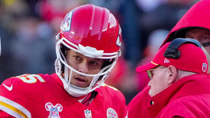 Dec 21, 2024; Kansas City, Missouri, USA; Kansas City Chiefs quarterback Patrick Mahomes (15) talks with head coach Andy Reid during the second half against the Houston Texans at GEHA Field at Arrowhead Stadium. Mandatory Credit: Denny Medley-Imagn Images