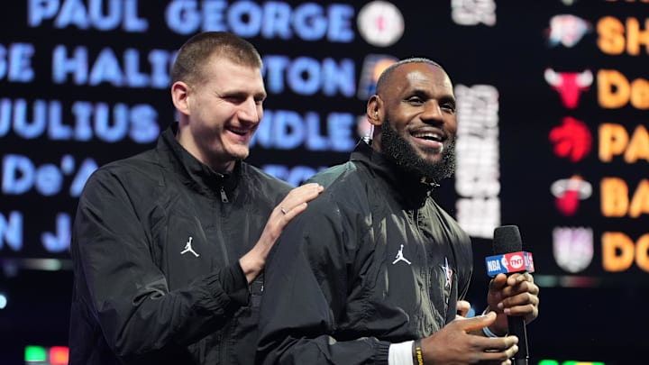 Feb 19, 2023; Salt Lake City, UT, USA; Team LeBron forward LeBron James (right) drafts center Nikola Jokic (15) before the 2023 NBA All-Star Game at Vivint Arena. Mandatory Credit: Kyle Terada-Imagn Images