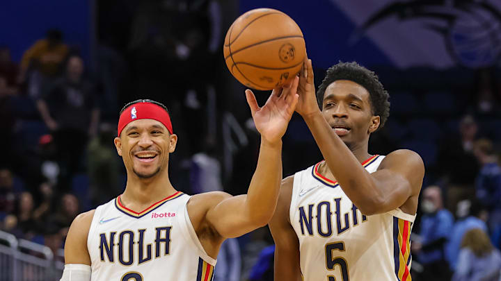 Dec 23, 2021; Orlando, Florida, USA; New Orleans Pelicans guard Josh Hart (3) and forward Herbert Jones (5) celebrate their win against the Orlando Magic at Amway Center. Mandatory Credit: Mike Watters-Imagn Images