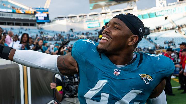Jacksonville Jaguars defensive end Travon Walker (44) celebrates with fans at EverBank Stadium, Sunday, Dec. 14, 2025, in Jacksonville, Fla. The Jaguars defeated the Jets 48-20. [Doug Engle/Florida Times-Union]
