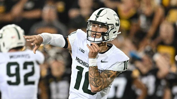 Sep 30, 2023; Iowa City, Iowa, USA; Michigan State Spartans quarterback Noah Kim (10) in action during the game against the Iowa Hawkeyes at Kinnick Stadium. Mandatory Credit: Jeffrey Becker-Imagn Images