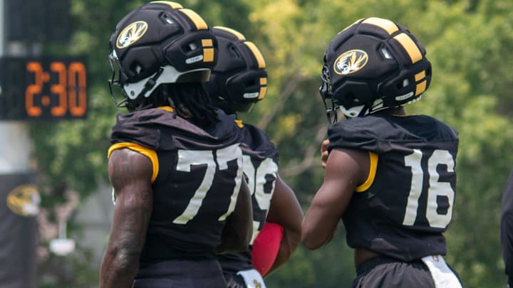  Aug 6, 2025; Columbia, MO, USA; Missouri Tigers running back Anthony Favrow (31), running back Tavorus Jones (22), Marquise Davis (77) line up.