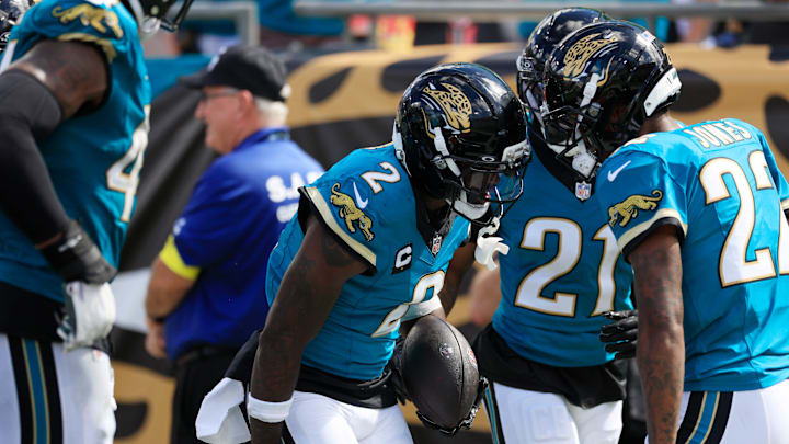 Jacksonville Jaguars cornerback Jourdan Lewis (2) celebrates his interception with cornerback Jarrian Jones (22) and cornerback Christian Braswell (21) during the fourth quarter of an NFL football matchup at EverBank Stadium, Sunday, Sept. 21, 2025, in Jacksonville, Fla. The Jaguars defeated the Texans 17-10.