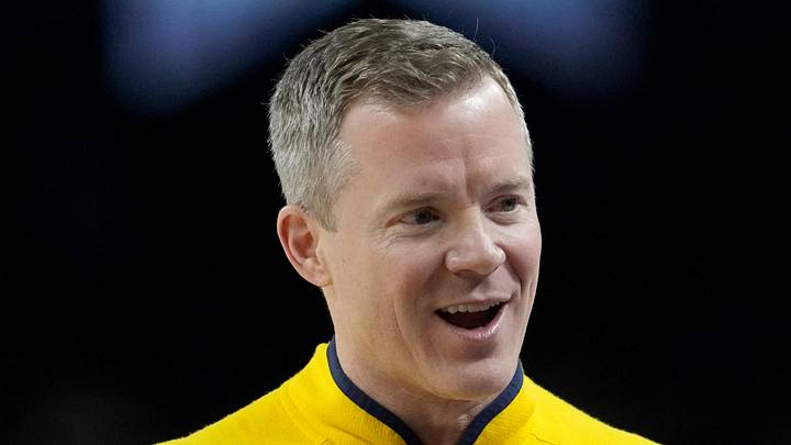 Michigan Wolverines head coach Dusty May talks with his team Monday, April 6, 2026, during the NCAA men's basketball tournament national championship game against the UConn Huskies at Lucas Oil Stadium in Indianapolis. Michigan Wolverines head coach Dusty May talks with his team Monday, April 6, 2026, during the NCAA men's basketball tournament national championship game against the UConn Huskies at Lucas Oil Stadium in Indianapolis.