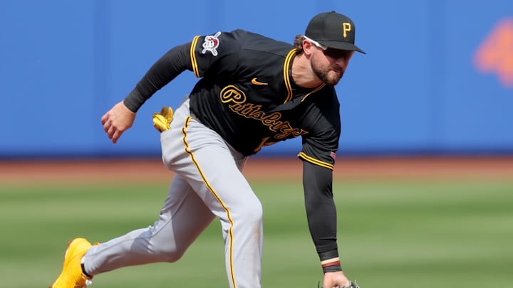 Mar 26, 2026; New York City, New York, USA; Pittsburgh Pirates shortstop Jared Triolo (19) fields a ground ball by New York Mets center fielder Luis Robert Jr. (not pictured) during the second inning at Citi Field. Mandatory Credit: Brad Penner-Imagn Images