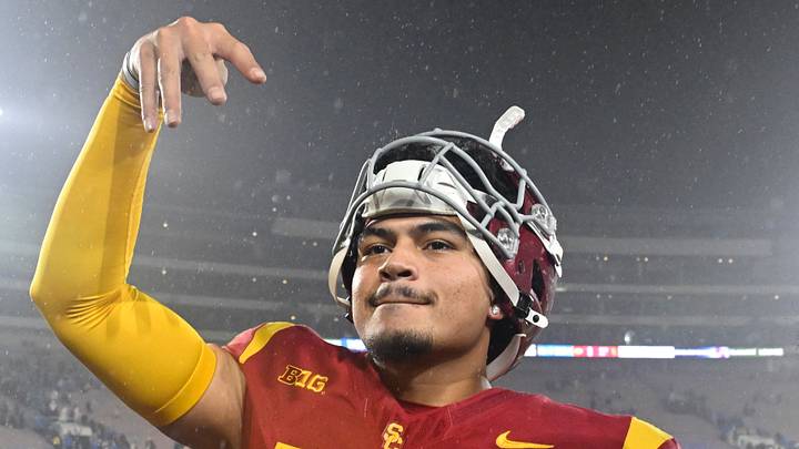 Nov 23, 2024; Pasadena, California, USA; USC Trojans quarterback Jayden Maiava (14) celebrates the win over UCLA at Rose Bowl. Mandatory Credit: Robert Hanashiro-Imagn Images Nov 23, 2024; Pasadena, California, USA; USC Trojans quarterback Jayden Maiava (14) celebrates the win over UCLA at Rose Bowl. Mandatory Credit: Robert Hanashiro-Imagn Images