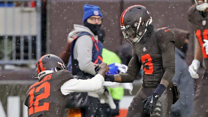 Cleveland Browns quarterback Shedeur Sanders (12) celebrates a touchdown with wide receiver Jerry Jeudy (3) during the first half of an NFL football game against the Tennessee Titans at Huntington Bank Field, Dec. 7, 2025, in Cleveland, Ohio.