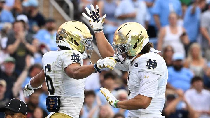 Oct 3, 2026; Chapel Hill, North Carolina, USA; Notre Dame Fighting Irish wide receiver Jordan Faison (6) celebrates with wide receiver Jaden Greathouse (1) after making a touchdown catch in the first quarter at Kenan Stadium. Oct 3, 2026; Chapel Hill, North Carolina, USA; Notre Dame Fighting Irish wide receiver Jordan Faison (6) celebrates with wide receiver Jaden Greathouse (1) after making a touchdown catch in the first quarter at Kenan Stadium.
