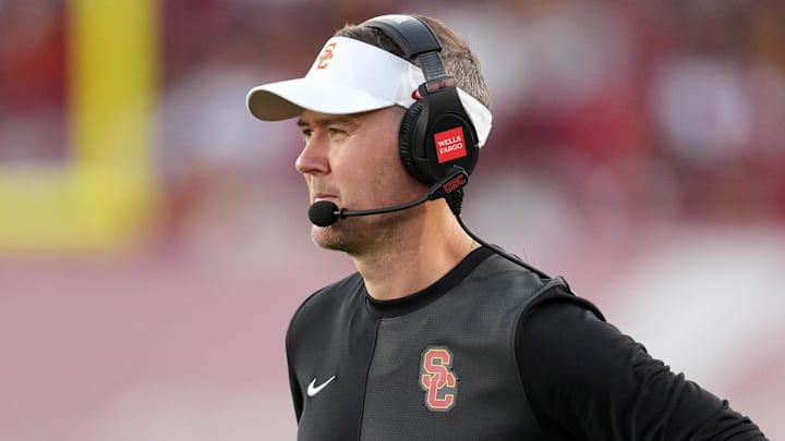 Aug 30, 2025; Los Angeles, California, USA; Southern California Trojans head coach Lincoln Riley watches from the sidelines against the Missouri State Bears in the first half at United Airlines Field at Los Angeles Memorial Coliseum. Mandatory Credit: Kirby Lee-Imagn Images
