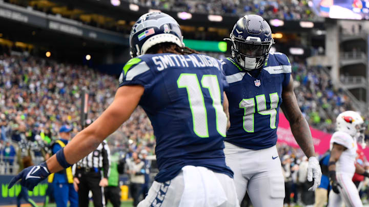 Nov 24, 2024; Seattle, Washington, USA; Seattle Seahawks wide receiver Jaxon Smith-Njigba (11) and wide receiver DK Metcalf (14) celebrate after Jaxon Smith-Njigba scored a touchdown against the Arizona Cardinals during the first half at Lumen Field. Nov 24, 2024; Seattle, Washington, USA; Seattle Seahawks wide receiver Jaxon Smith-Njigba (11) and wide receiver DK Metcalf (14) celebrate after Jaxon Smith-Njigba scored a touchdown against the Arizona Cardinals during the first half at Lumen Field.