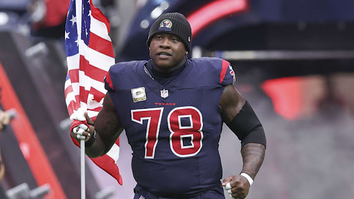 Nov 19, 2023; Houston, Texas, USA; Houston Texans offensive tackle Laremy Tunsil (78) runs onto the field before the game against the Arizona Cardinals at NRG Stadium. Mandatory Credit: Troy Taormina-Imagn Images