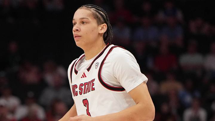 Mar 11, 2026; Charlotte, NC, USA; NC State Wolfpack guard Matt Able (3) brings the ball up the court in the second half at Spectrum Center. Mandatory Credit: Bob Donnan-Imagn Images