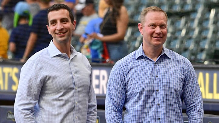 Aug 8, 2025; Milwaukee, Wisconsin, USA;  New York Mets president of baseball operations David Stearns (left) talks to Milwaukee Brewers general manager Matt Arnold before game at American Family Field. Mandatory Credit: Benny Sieu-Imagn Images