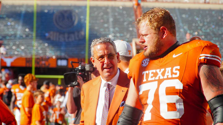 Aug 31, 2024; Austin, Texas, USA; Texas Longhorns athletic director Chris Del Conte and lineman Hayden Conner (77) after defeating the Colorado State Rams at Darrell K Royal-Texas Memorial Stadium. Mandatory Credit: Aaron Meullion-Imagn Images