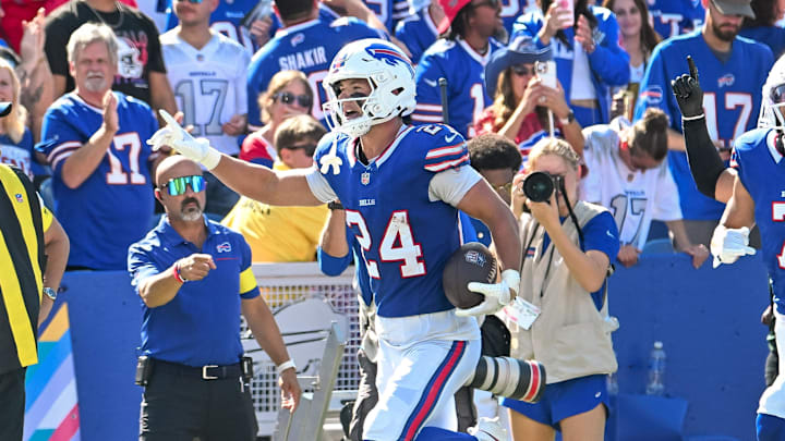 Sep 28, 2025; Orchard Park, New York, USA; Buffalo Bills safety Cole Bishop (24) reacts to making an interception against the New Orleans Saints in the second quarter at Highmark Stadium.