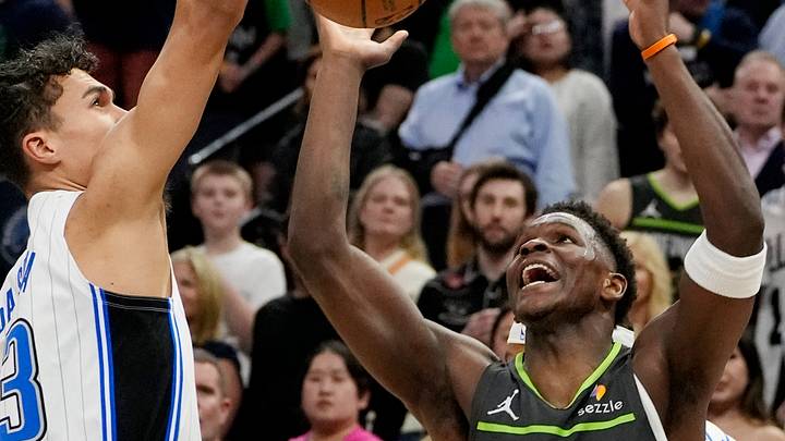 Mar 14, 2025; Minneapolis, Minnesota, USA; Minnesota Timberwolves guard Anthony Edwards (5) defends against Orlando Magic forward Tristan da Silva (23) in the first quarter at Target Center. Mandatory Credit: Bruce Kluckhohn-Imagn Images