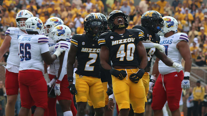 Sep 6, 2025; Columbia, Missouri, USA; Missouri Tigers linebacker Josiah Trotter (40) celebrates a tackle in the first quarter of the Border War against the Kansas Jayhawks at Faurot Field at Memorial Stadium. 