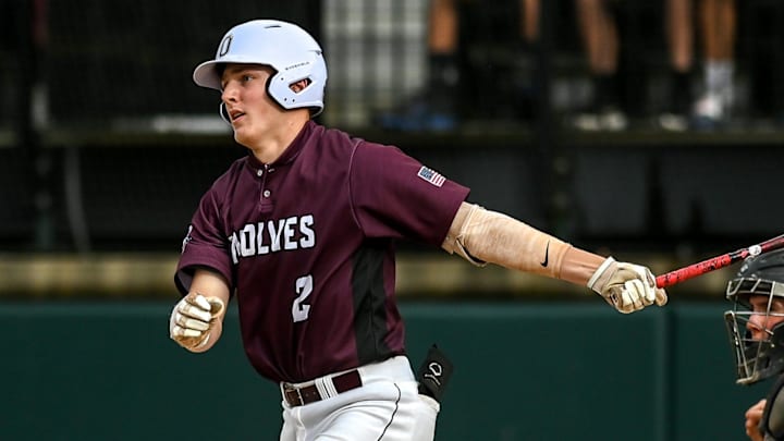 Okemos' Caleb Bonemer gets a hit against Mason during the third inning on Thursday, May 26, 2022, at McLane Stadium on the MSU campus in East Lansing.