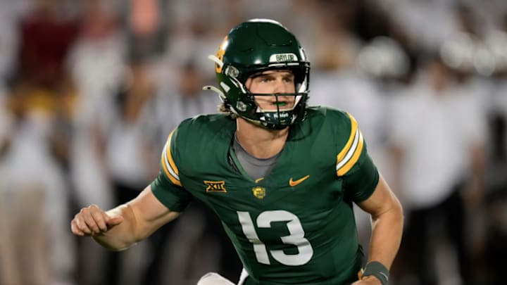 Baylor quarterback Sawyer Robertson runs on the field during the first half of an NCAA college football game against Iowa State, Saturday, Oct. 5, 2024, in Ames, Iowa. 