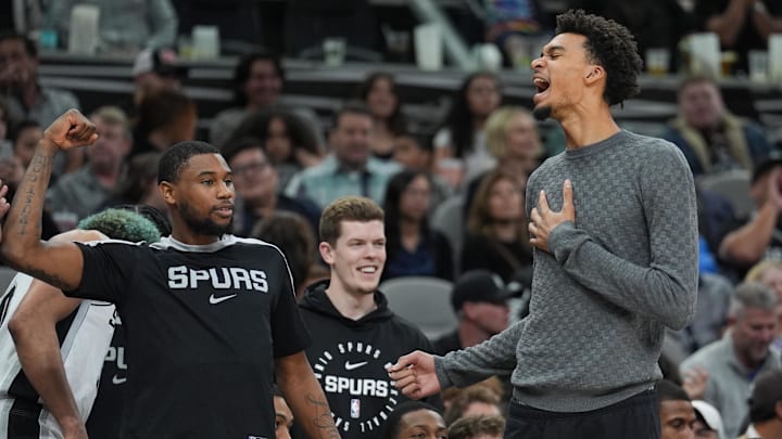 Mar 4, 2025; San Antonio, Texas, USA; San Antonio Spurs guard Blake Wesley (14) and center Victor Wembanyama (1) celebrate on the sideline in the second half against the Brooklyn Nets at Frost Bank Center. Mar 4, 2025; San Antonio, Texas, USA; San Antonio Spurs guard Blake Wesley (14) and center Victor Wembanyama (1) celebrate on the sideline in the second half against the Brooklyn Nets at Frost Bank Center.