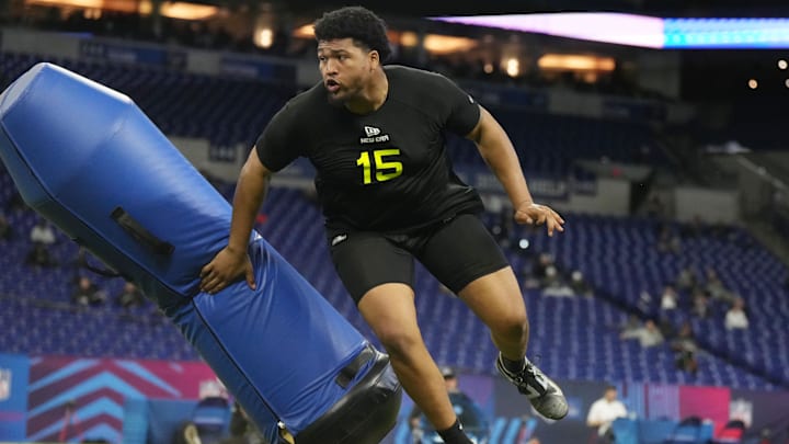 Oregon defensive lineman Derrick Harmon participates in drills during the 2025 NFL Combine at Lucas Oil Stadium.