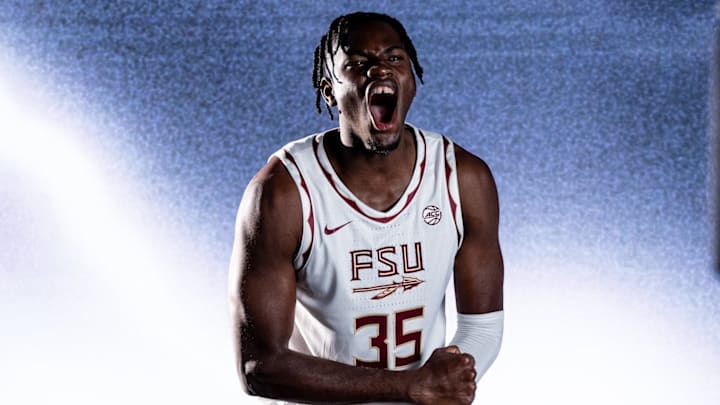 Florida State Seminoles center Waka Mbatch debuts the new home white basketball jerseys at a photoshoot