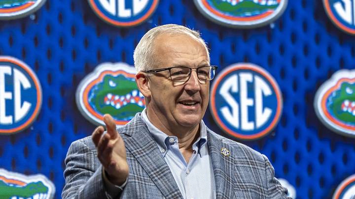 Oct 15, 2025; Birmingham, AL, USA; SEC commissioner Greg Sankey introduces Florida Gators head coach Todd Golden during SEC Media Days at Grand Bohemian Hotel. Mandatory Credit: Vasha Hunt-Imagn Images Oct 15, 2025; Birmingham, AL, USA; SEC commissioner Greg Sankey introduces Florida Gators head coach Todd Golden during SEC Media Days at Grand Bohemian Hotel. Mandatory Credit: Vasha Hunt-Imagn Images