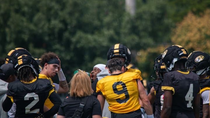 Aug 6, 2025; Columbia, MO, USA; Missouri Tigers quarterback Beau Pribula (9) talks with the team at the conclusion of a fall camp practice at Mizzou Athletic Training Complex.