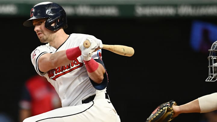 Sep 14, 2024; Cleveland, Ohio, USA; Cleveland Guardians center fielder Lane Thomas (8) hits a double during the sixth inning against the Tampa Bay Rays at Progressive Field. Mandatory Credit: Ken Blaze-Imagn Images Sep 14, 2024; Cleveland, Ohio, USA; Cleveland Guardians center fielder Lane Thomas (8) hits a double during the sixth inning against the Tampa Bay Rays at Progressive Field. Mandatory Credit: Ken Blaze-Imagn Images