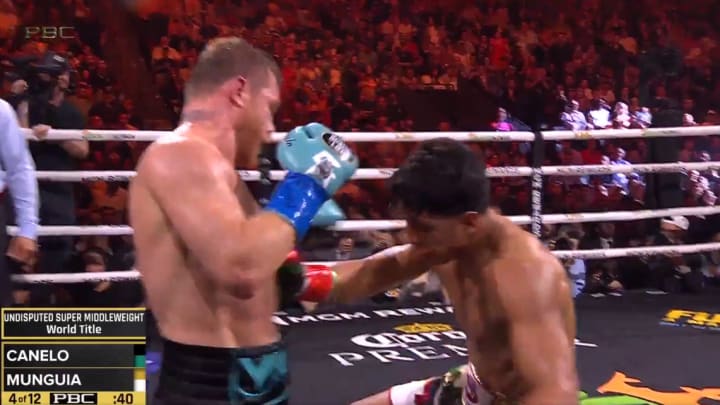 Canelo Alvarez drops Jaime Munguia in round four of their marquee championship fight. Canelo Alvarez drops Jaime Munguia in round four of their marquee championship fight.