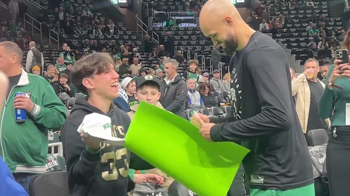 This fan traveled over 5000 miles to see his favorite player.